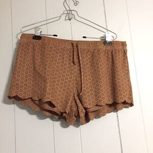 Faux suede scalloped eyelet design shorts